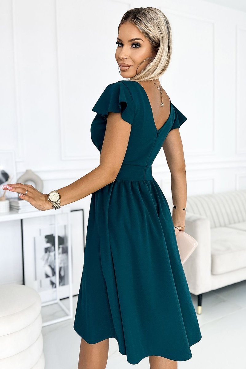 Model wearing Numoco Emerald Flutter-Sleeve Fit-and-Flare Midi Dress