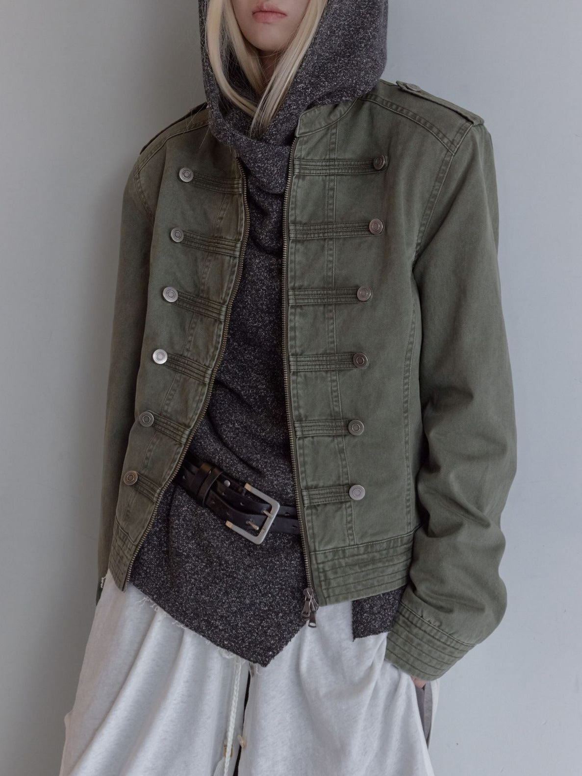 Army green cropped military-style twill jacket on model, front view, stand collar