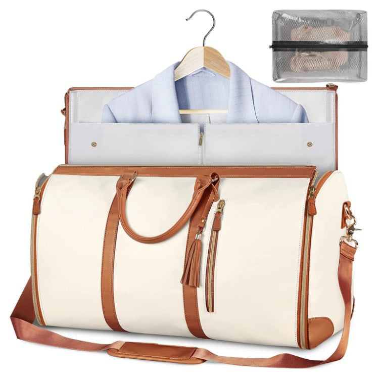 Cream and brown foldable garment duffle bag open with shirt on hanger, showing interior and mesh shoe pouch