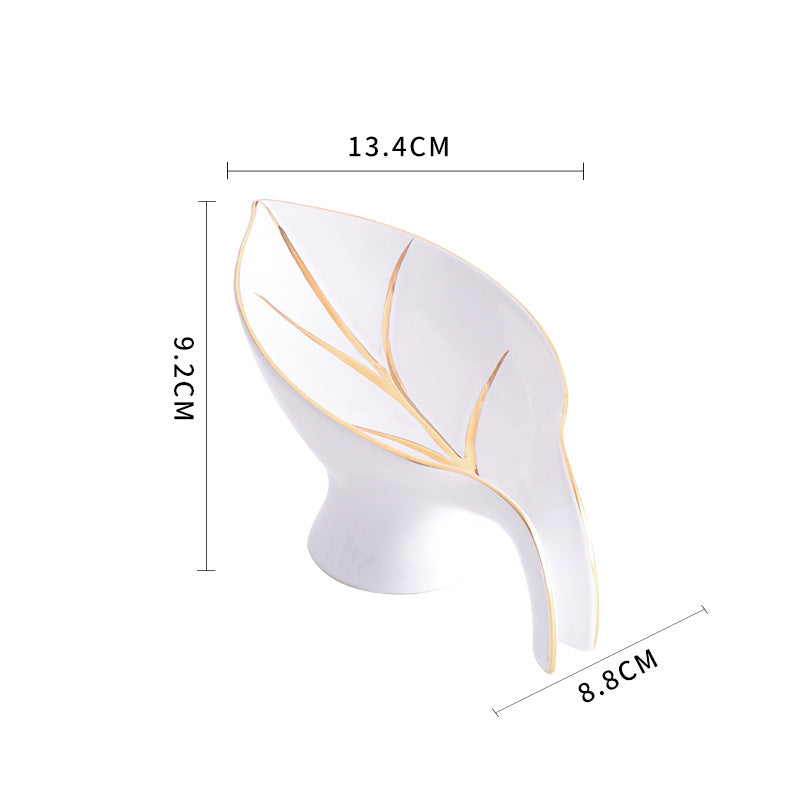Size chart for white ceramic leaf-shaped soap dish with gold-tone leaf-vein detailing