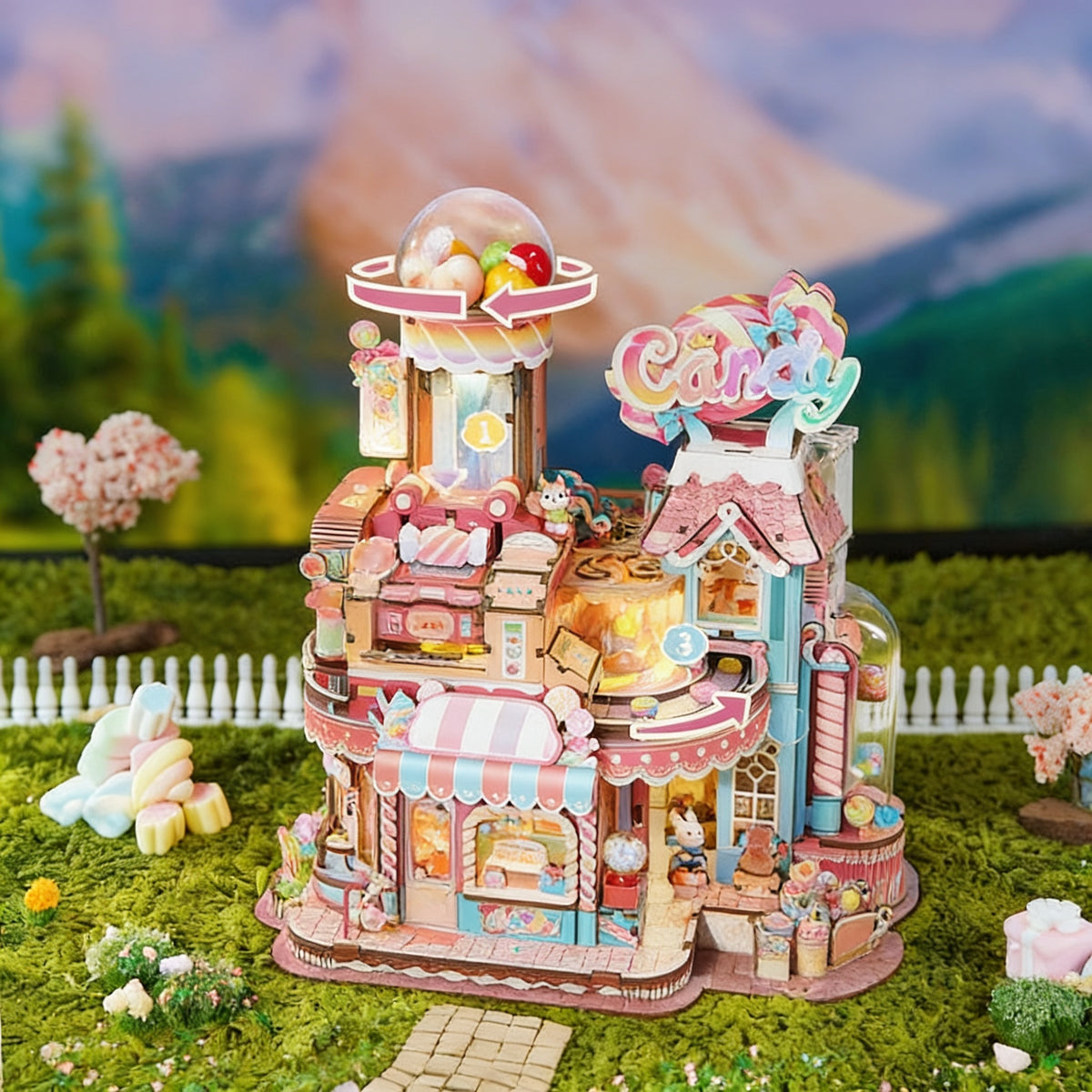 Wooden candy workshop model from a slight angle, showing the tower with candy dome and the striped awning on the shop front
