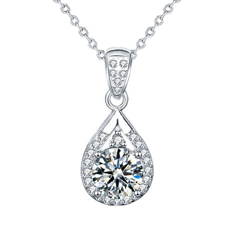 Smaller teardrop moissanite pendant on a white background, showing the 1 carat size option