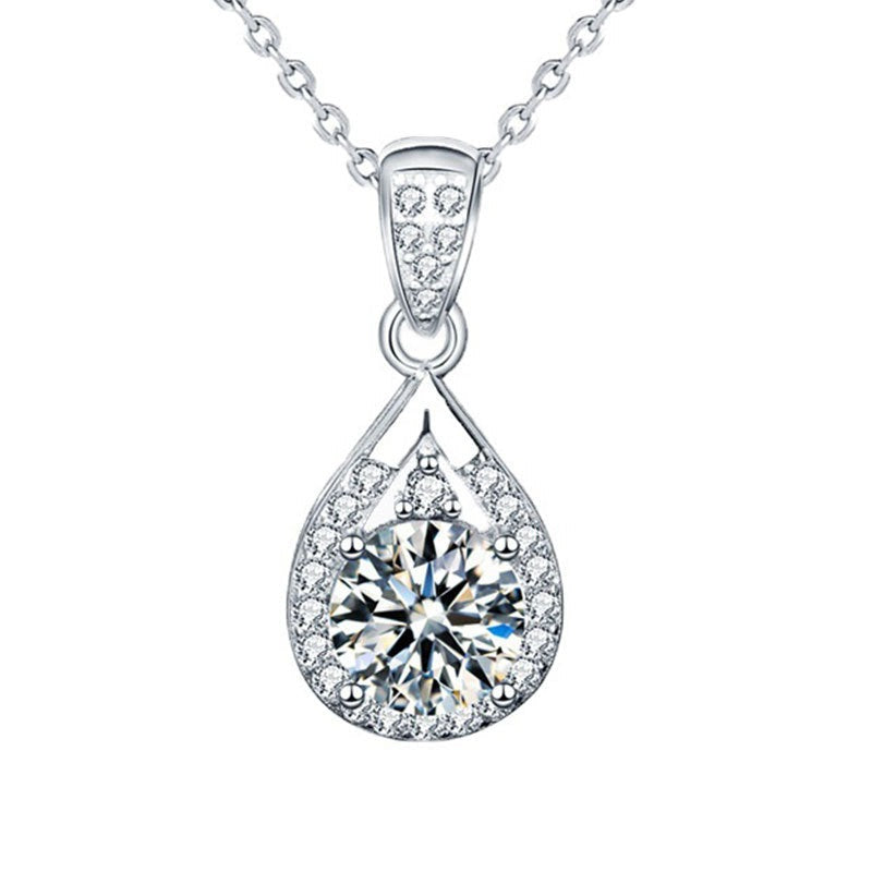 Medium teardrop moissanite pendant on a white background, showing the 2 carat size option