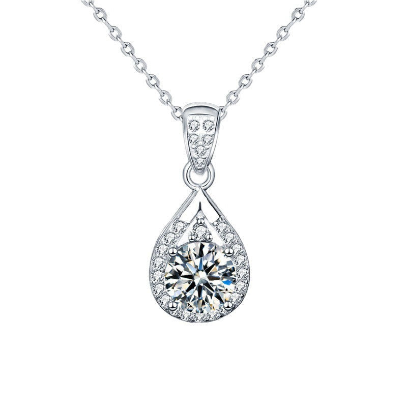 Larger teardrop moissanite pendant on a white background, showing the 3 carat size option