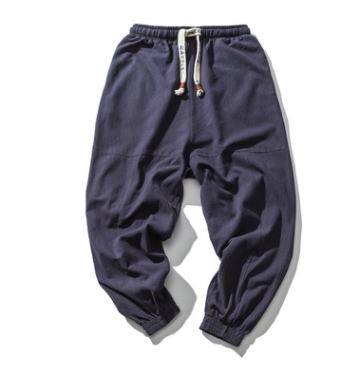 Navy relaxed drop-crotch joggers, flat lay, front view, showing drawstring and ribbed cuffs