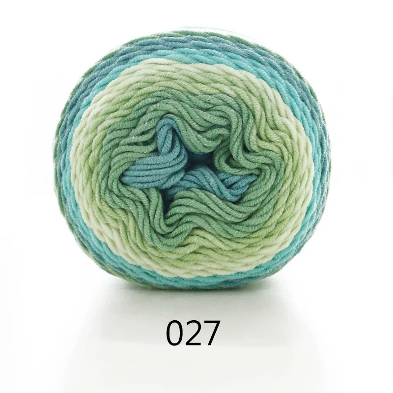 Gradient cotton-blend knitting yarn ball, colourway 027, green and blue swirl pattern