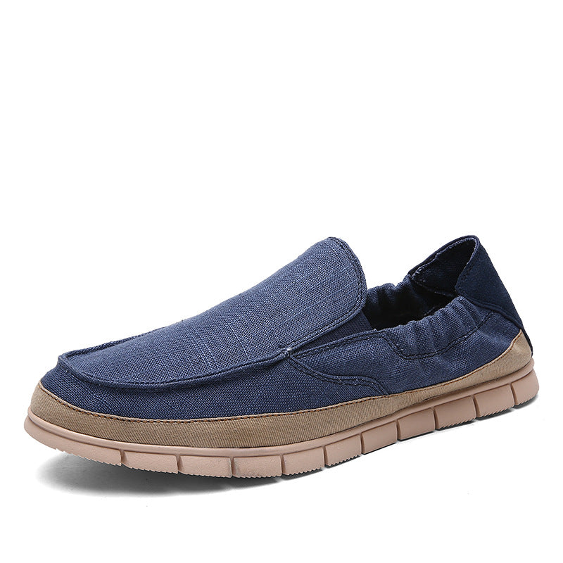 Linen-canvas slip-on loafer in dark blue, front view on white background