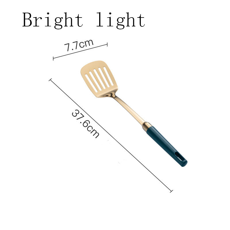 Gold-tone slotted turner with teal handle, bright light finish, size chart showing 37.6cm length and 7.7cm head width