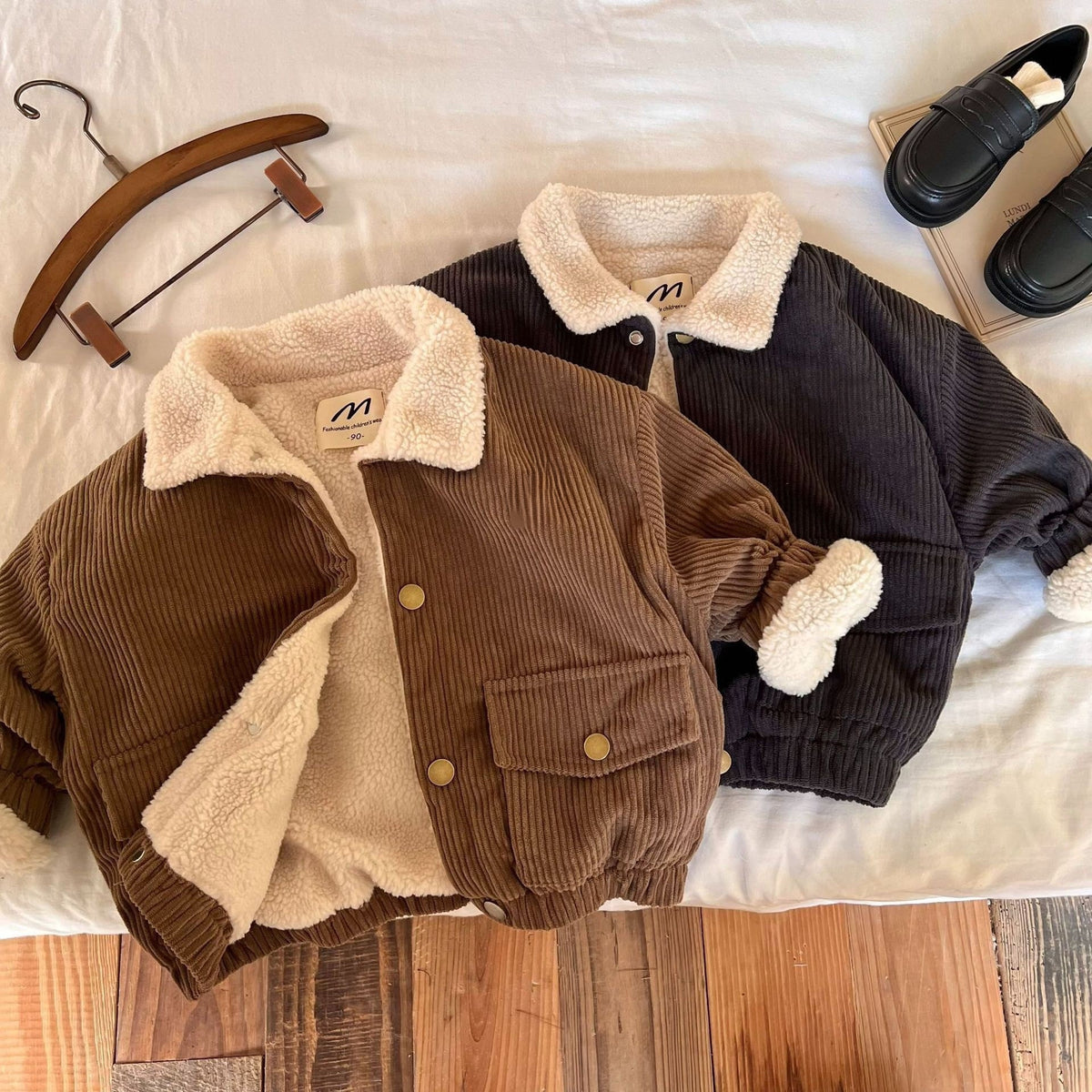 Brown and dark grey kids' jackets with plush collars