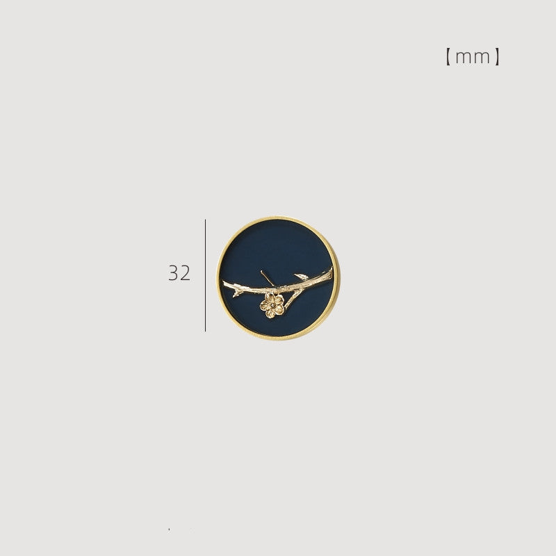 32 mm enamelled drawer knob with gold-tone rim and blue background featuring a wintersweet branch design