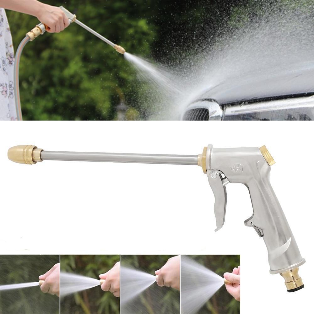 Garden hose spray gun with adjustable nozzle in use, spraying water on a car, hand-held, silver and brass-tone, outdoor