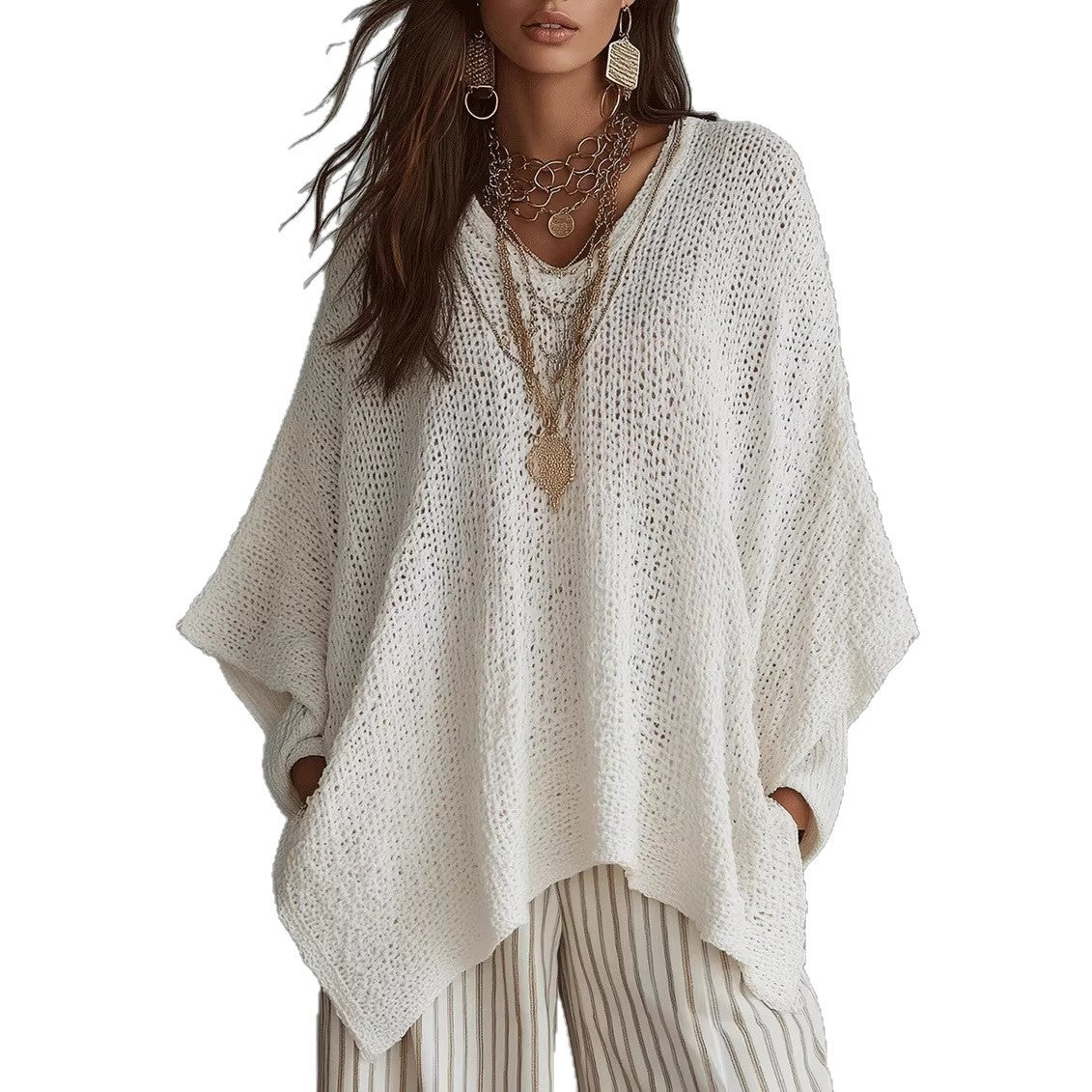 Oversized open-knit top in white, front view on model, V-neck, dolman sleeves, asymmetric hem, against white background