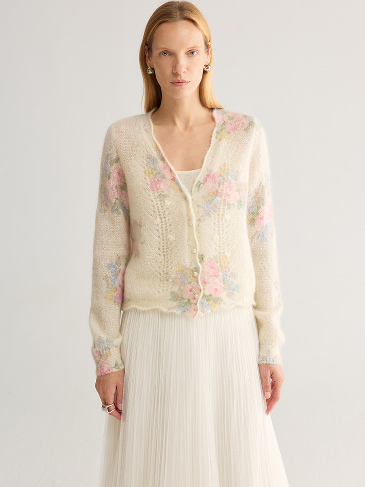 Floral jacquard V-neck cardigan with pearl-look buttons, cream base with pastel floral print, front view on model wearing
