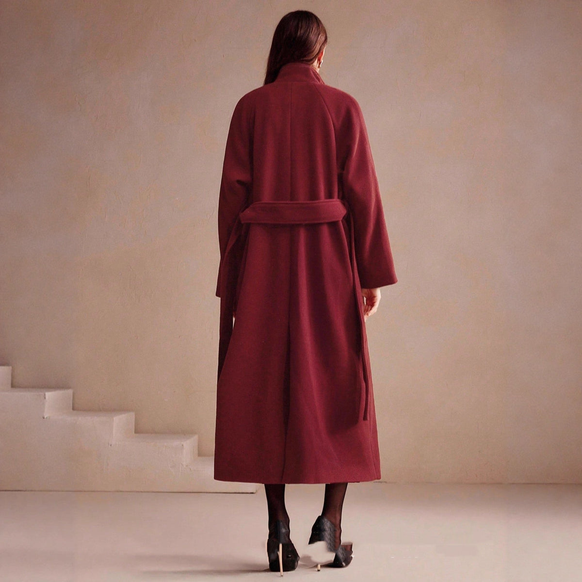 Long double-breasted wrap coat in wine red, back view, model standing