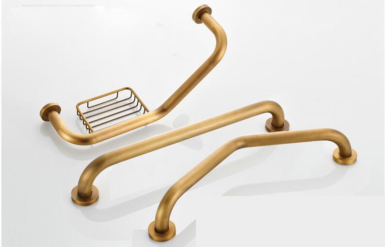 Three antique gold wall grab bars, two straight and one angled with soap basket, displayed flat
