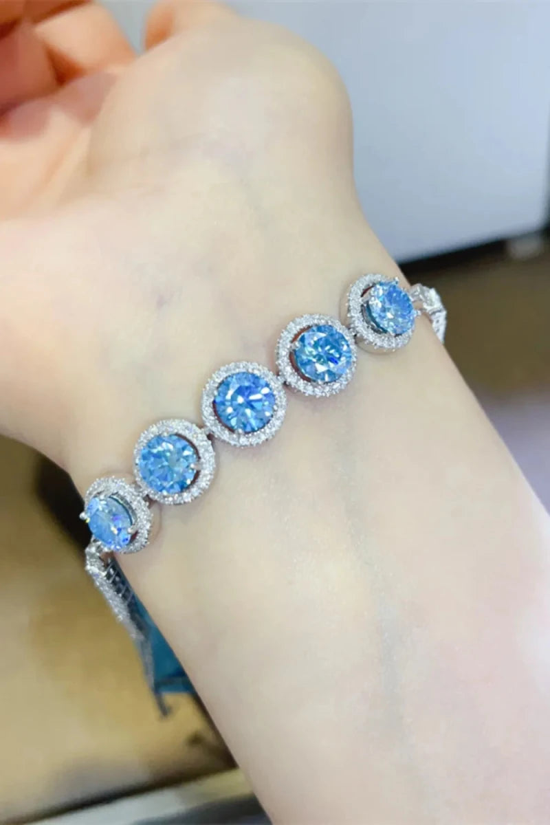 Sparkling 5 carat moissanite bracelet on model's wrist in sterling silver - fashion jewelry accessory