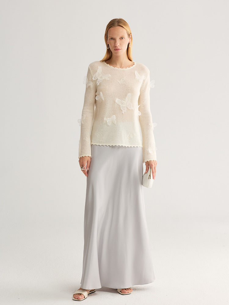 Butterfly Appliqué Crew Neck Knit Top in cream, worn by model, full front view, paired with light grey skirt and clutch