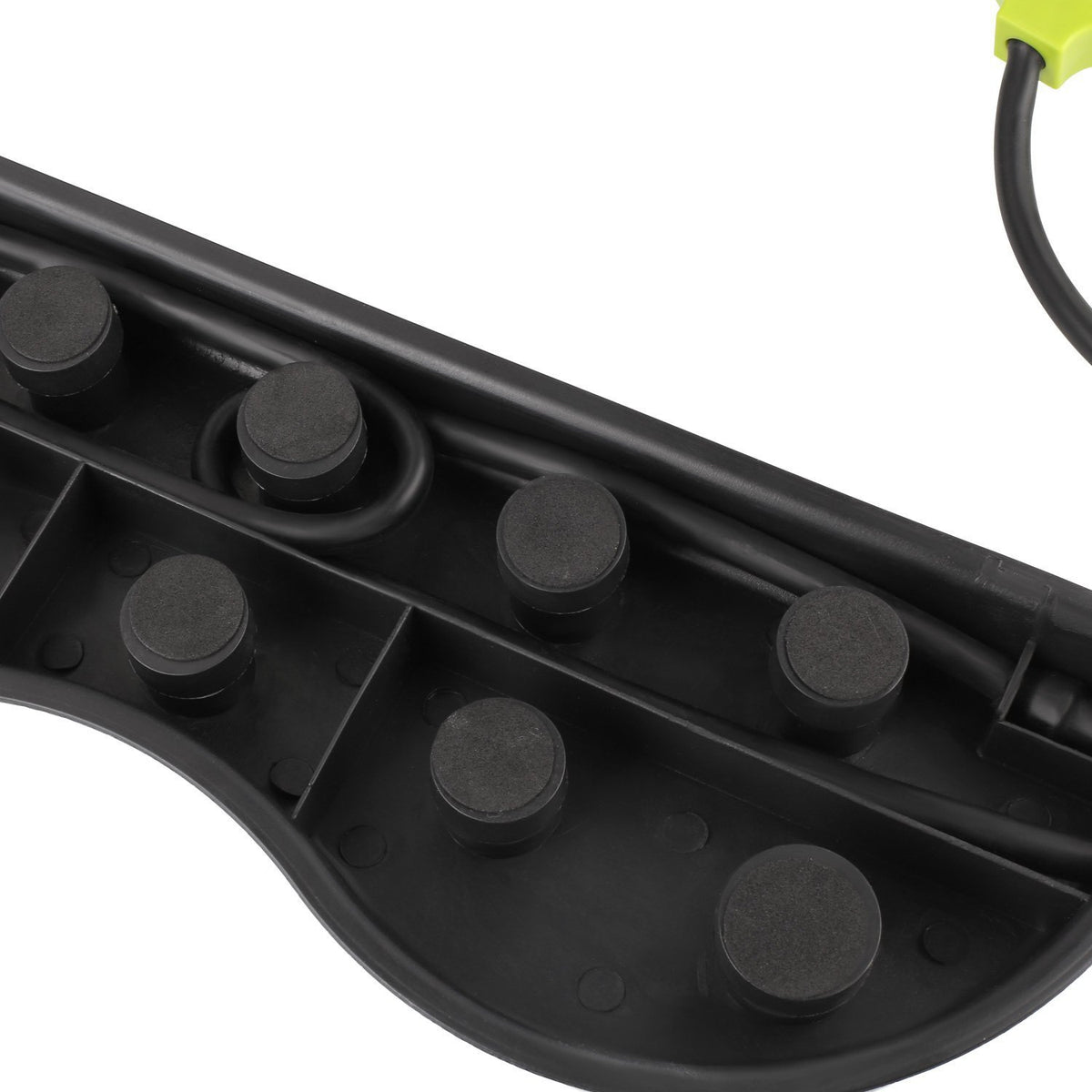 Close-up of black cushioned base with ten rubber pads arranged in two rows, detail view