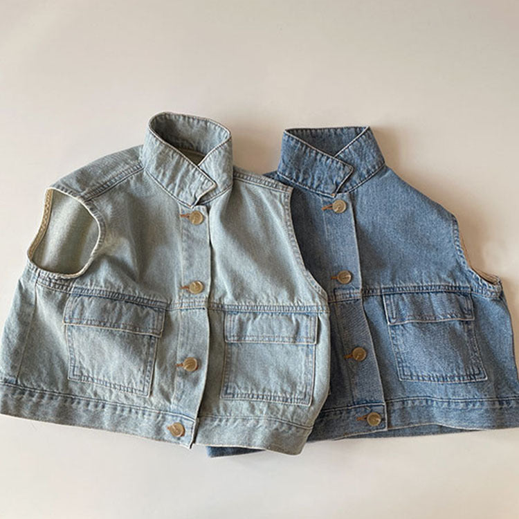 Kids' denim vest in light blue and deep blue laid side by side