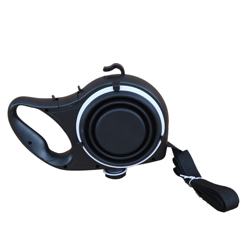 Dog lead with built-in water bottle and fold-out bowl, black, side view showing handle and strap attachment