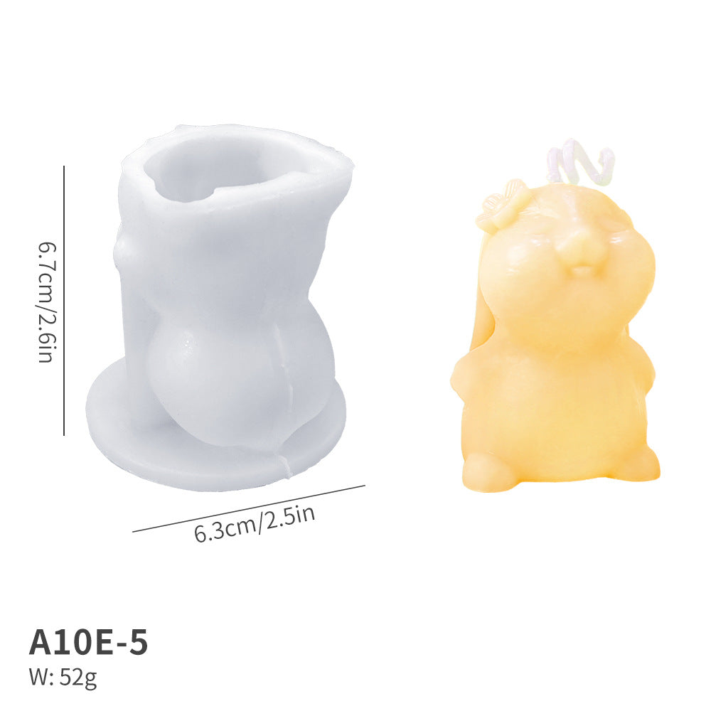 White silicone mould and yellow rabbit-shaped candle with dimensions marked, model number A10E-5 and weight listed