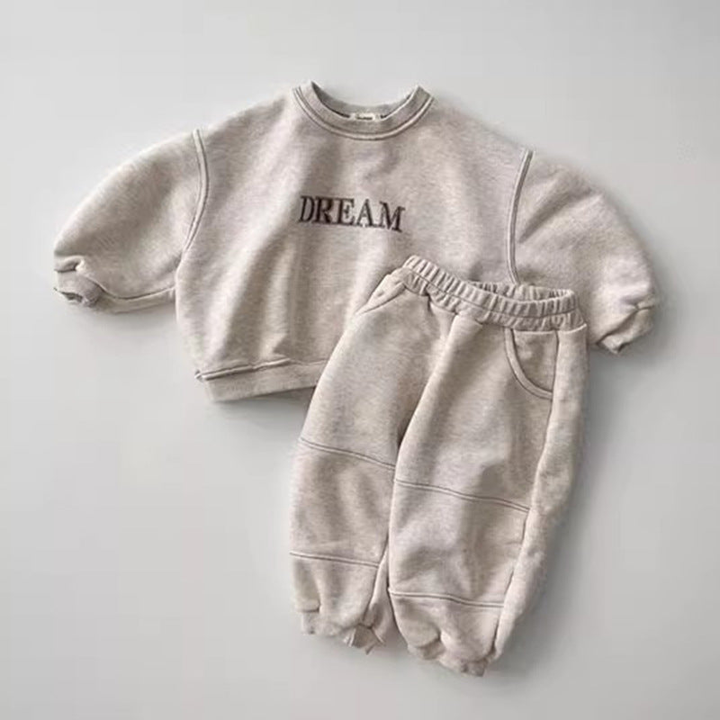 Light grey kids' jogging set with DREAM on the sweatshirt