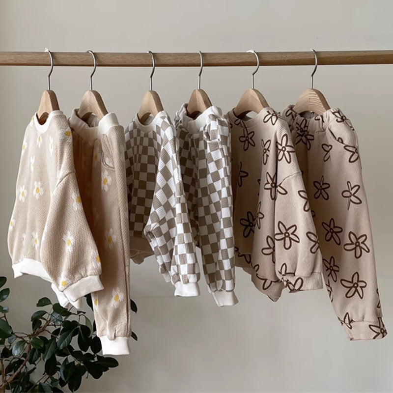 Side view of the sets hanging on a rail