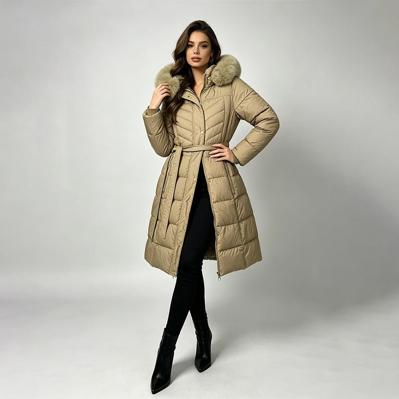 Long belted puffer coat with fur-look hood trim in khaki, front view on model, knee-length, self-fabric belt, front zip