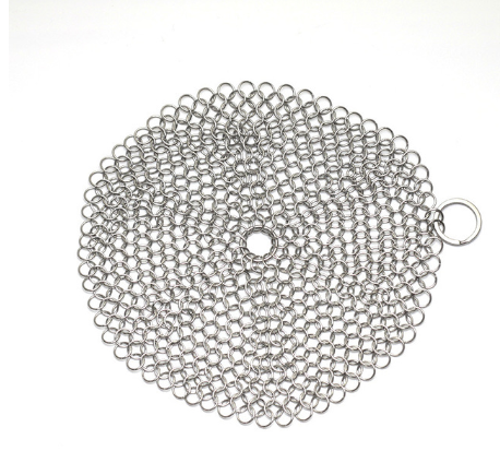 Round stainless steel chainmail scrubber, flat lay, top view, with hanging loop, white background