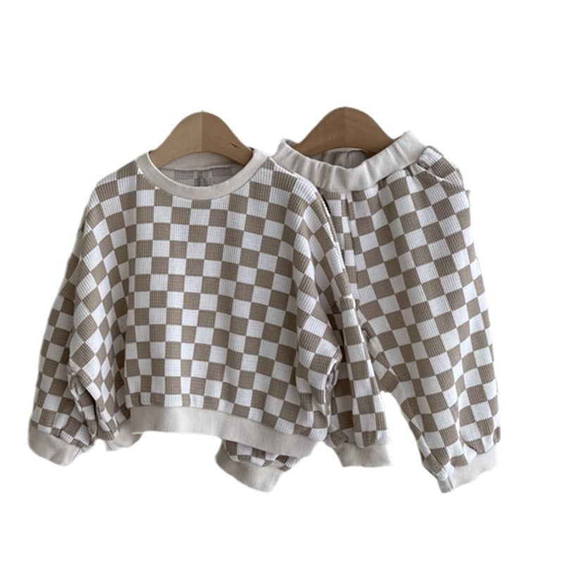 Check print sweatshirt and trousers on a white background