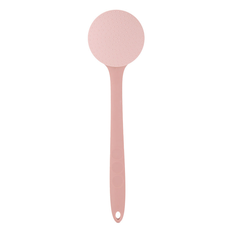 Light pink long-handle back lotion applicator, front view with nubbed head and hanging hole