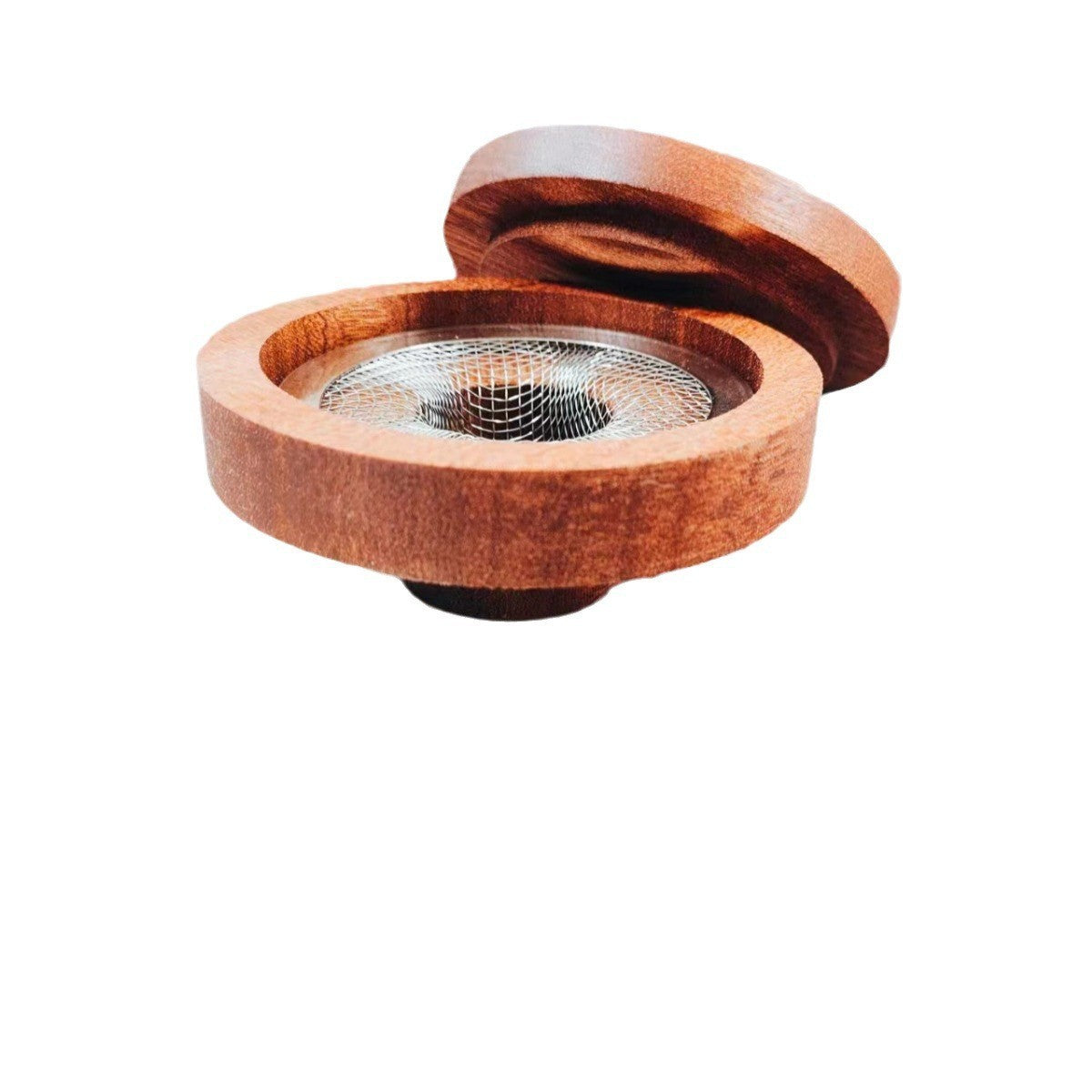 Thick round dark wood cocktail smoker top with the lid open, showing the metal mesh chamber inside
