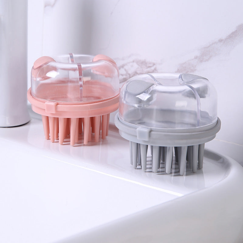 Pink and grey shampoo brushes standing on a white bathroom sink, side by side