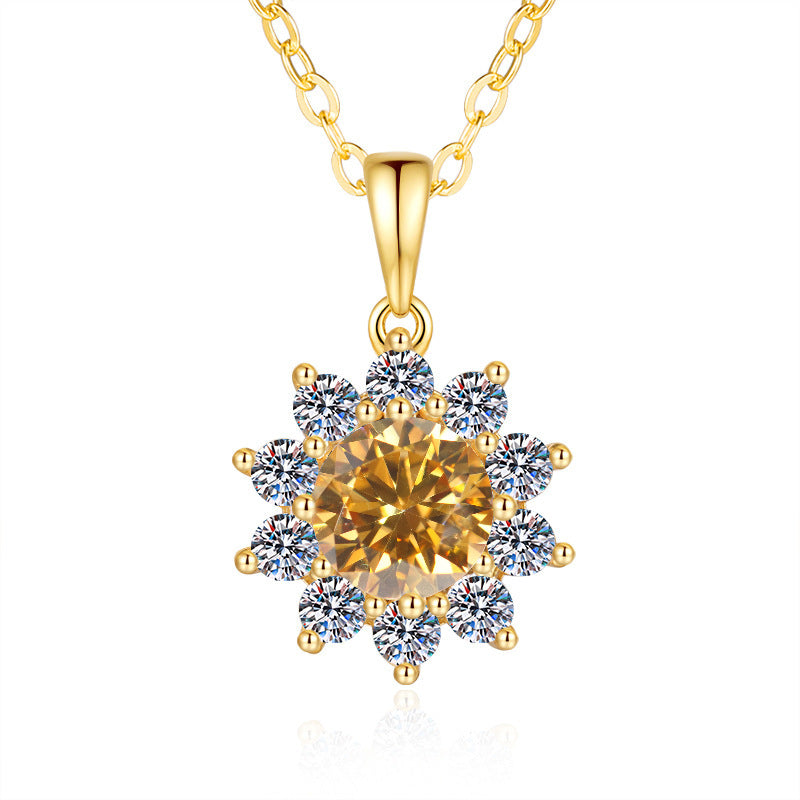Goudkleurige zonnebloem hanger ketting met een champagnekleurige middensteen