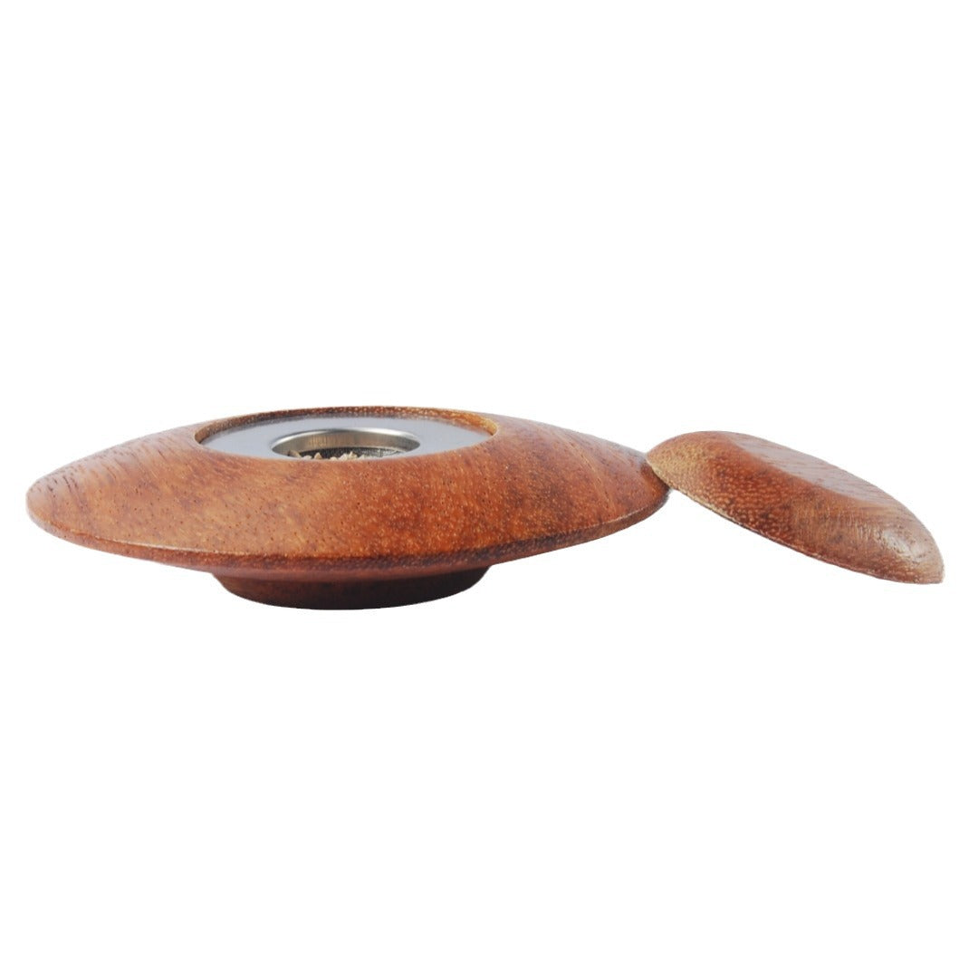 Flat disc-shaped dark wood cocktail smoker top with small matching lid and central metal mesh