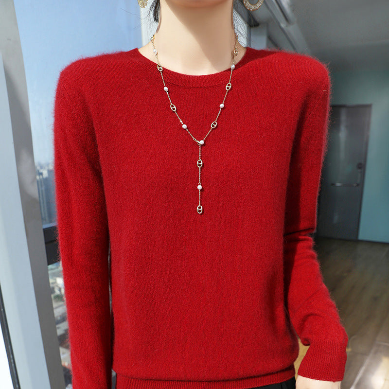 Red mercerised wool crew-neck sweater on a model, front view