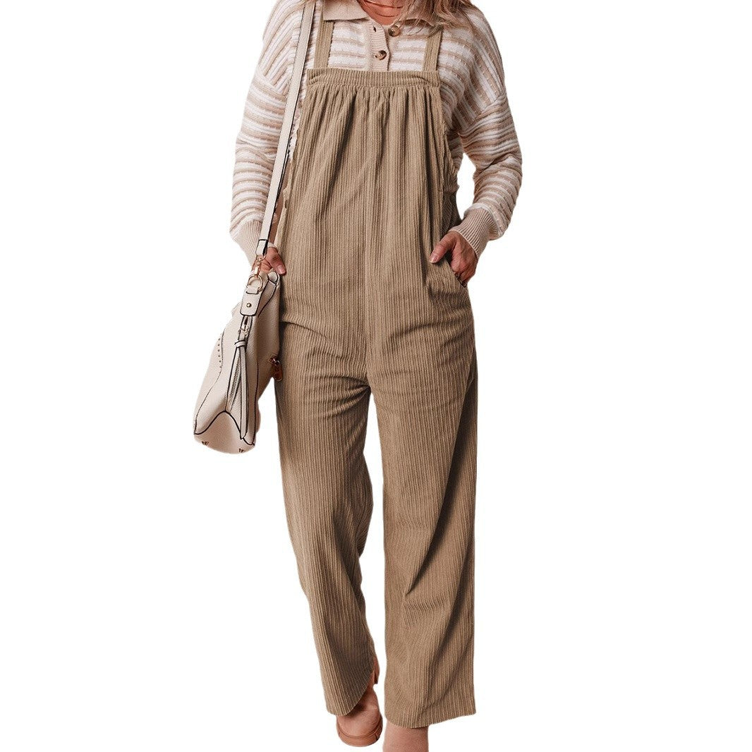 Corduroy wide-leg dungarees in beige with vertical stripes, front view on model against white background