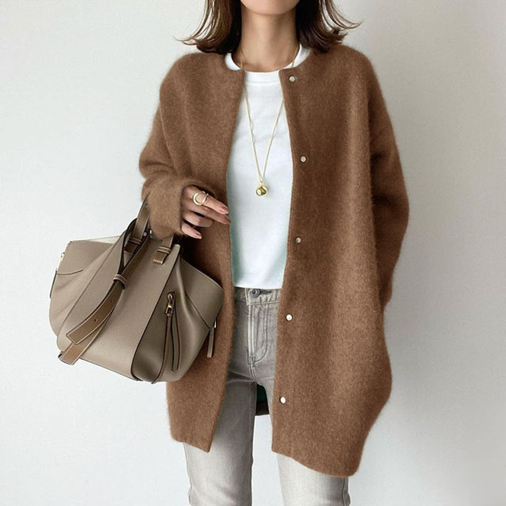 Loose knit cardigan coat in brown, front view on model, round neck, button front, knee-length, relaxed fit