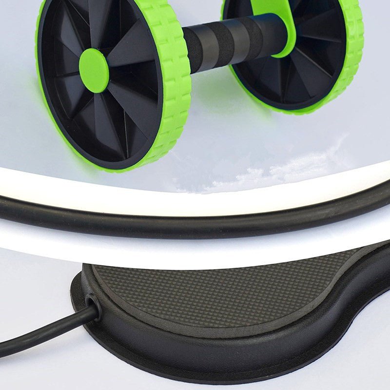Close-up of a green and black double wheel with a grip handle