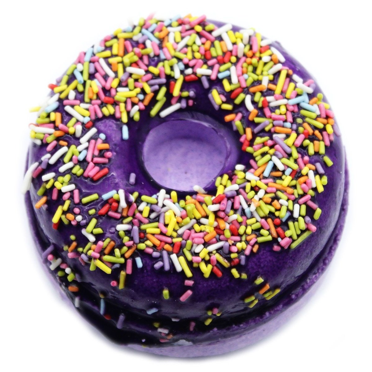 Colorful sprinkle donut-shaped bath bomb with blackberry and almond scent, ready for a relaxing soak