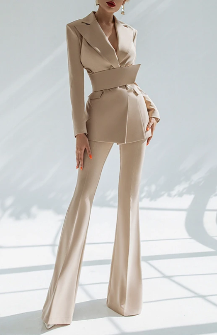 Camel belted blazer and flared trouser suit on model, front view, high-waisted trousers, wide waist belt, lapels, lightly