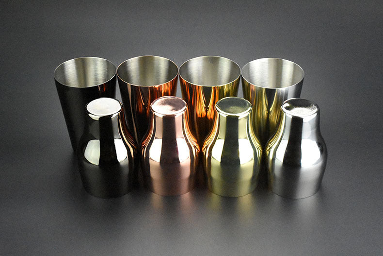 Two-section stainless steel cocktail shaker, 650 ml, in black, rose gold, gold-tone and silver finishes, arranged in two