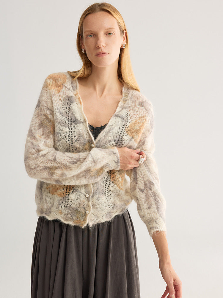 Floral jacquard V-neck cardigan with pearl-look buttons, beige and brown floral print, front view on model wearing dark grey