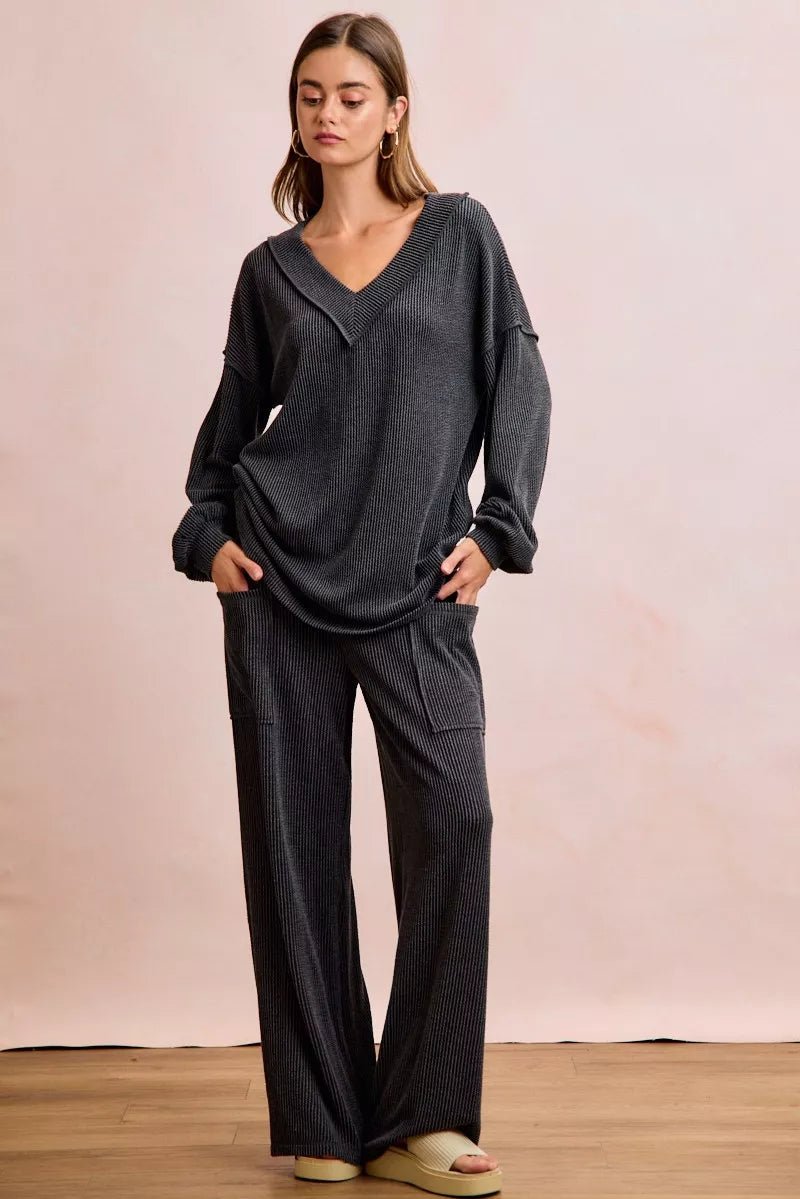 Woman wearing BiBi two-tone cord rib contrast stitching V-neck top and pants set - fashion ensemble