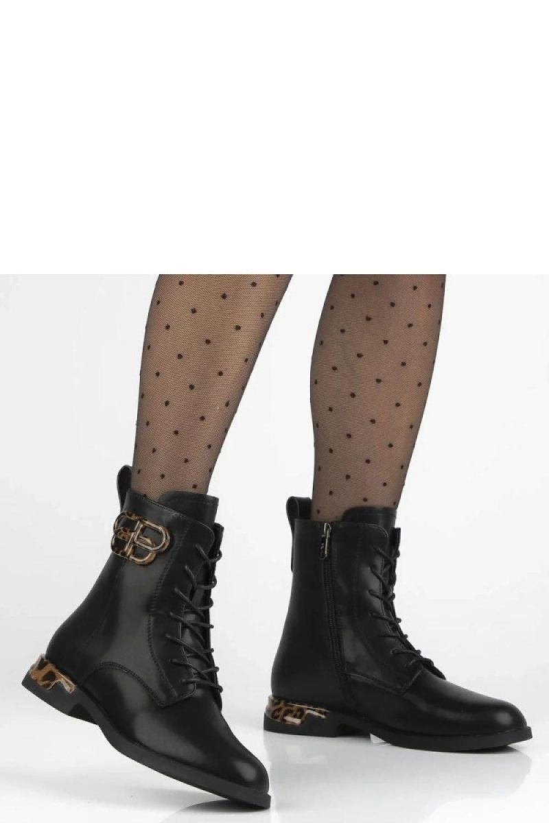 Black leather ankle boots with panther motif and gold accents — Solea footwear