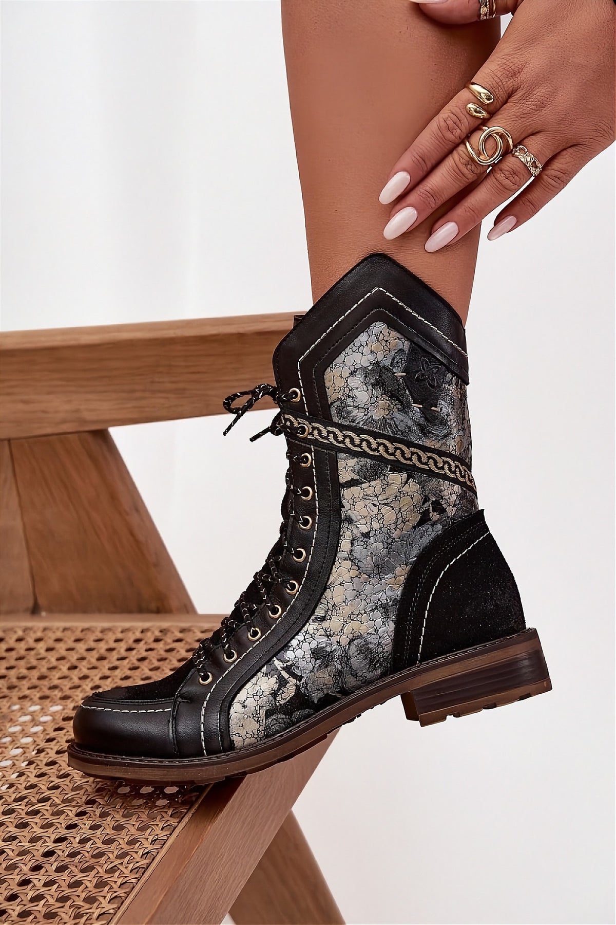 Black women's ankle boots with sleek silhouette and comfortable sole from Step In Style
