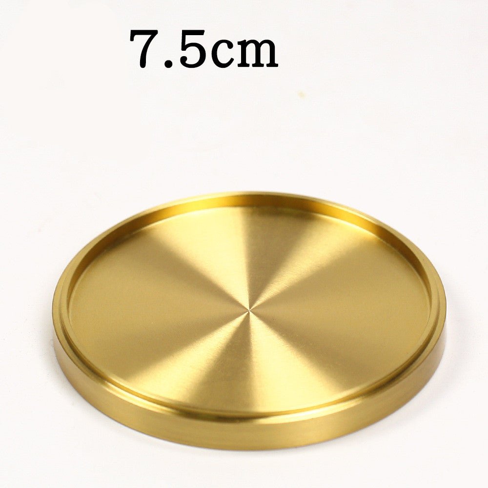 Brushed gold-tone metal coaster, 7.5 cm diameter, shown from top on white background