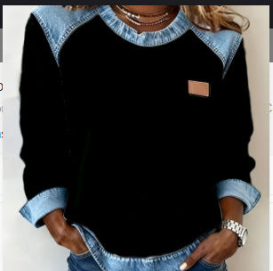 Black long-sleeve waffle-knit top with denim-look yoke and chest patch, front view on model