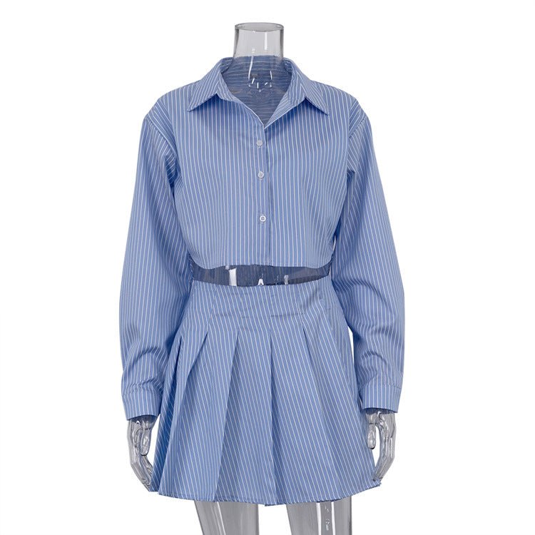 Blue and white striped cropped shirt and pleated mini skirt set on a clear mannequin, front view