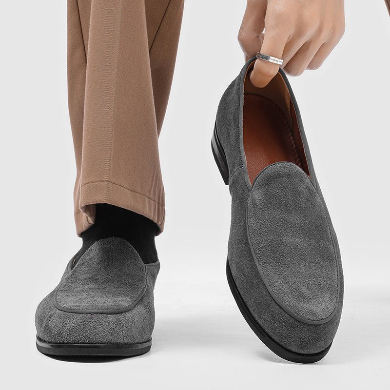Grey suede-look men's loafer, front view worn on foot, matching loafer held at an angle showing the insole